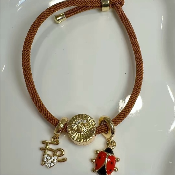 Red Cord Bracelet with Gold Charms - Picture 8 of 9